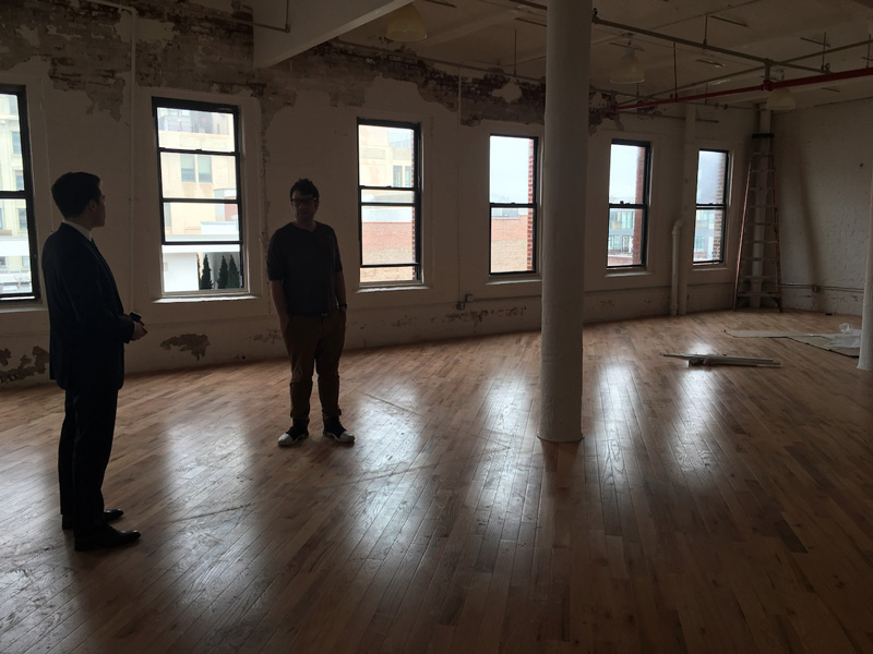 Jeremy viewing 68 Jay Street office with broker.